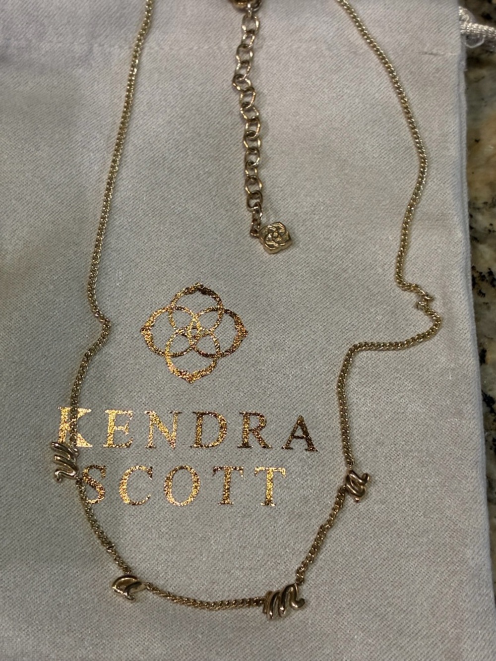 Kendra Scott gold “Mama” necklace